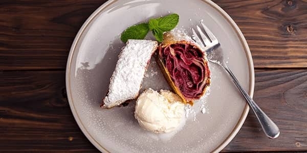 Viennese strudel with cherries and ice cream