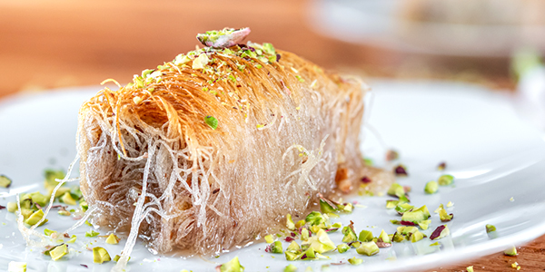 Greek dessert with kadaif dough and nuts