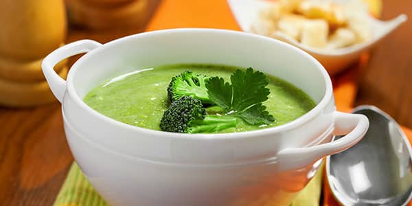 Light cream soup with broccoli and processed cheese
