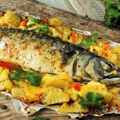 Рыба с овощами, запеченная в духовке